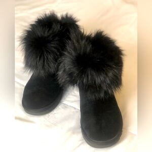 UGG Boots with fur and a large rhinestone on the side for that extra flare.EUC